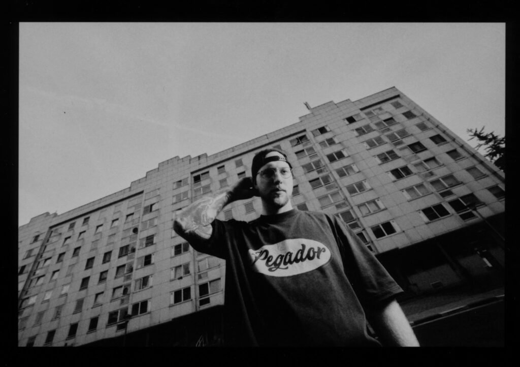 Mista Ill in front of a building