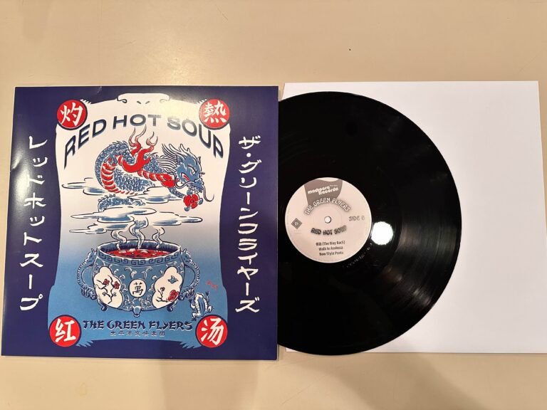 The Green Flyers album cover and black vinyl on white innersleeve