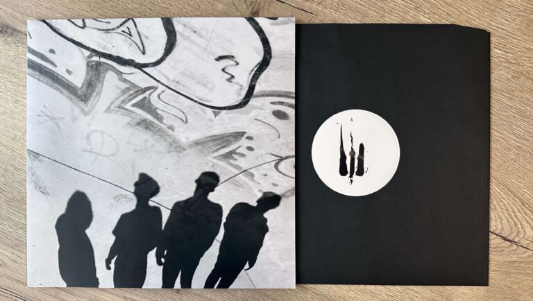 Outflow – Difuz album cover with vinyl record inside black innersleeve